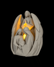 Luminária do anjo guardião com a luz atravessando as asas e o vão central